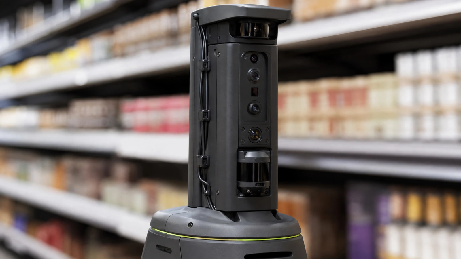 Nahaufnahme des Sensor- und Scanturms eines Handelsroboters mit feinem Lime-Akzent